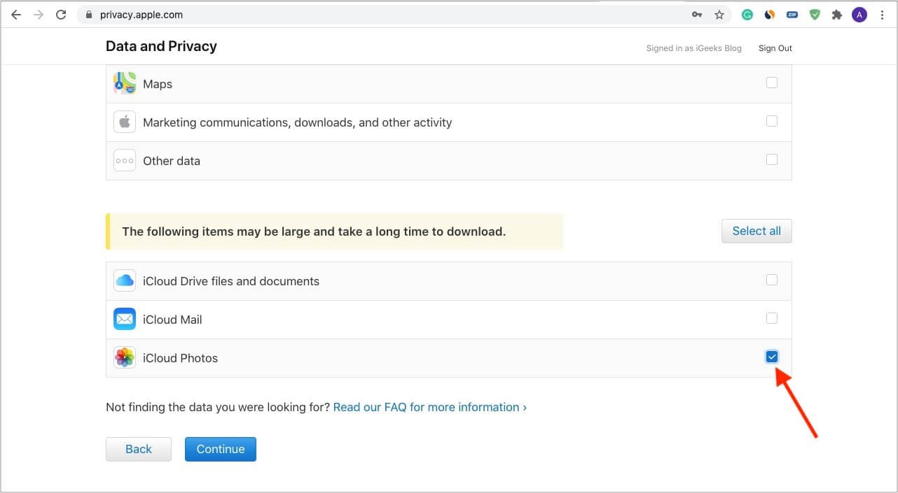 Check iCloud Photos and click Continue to download your photos and videos