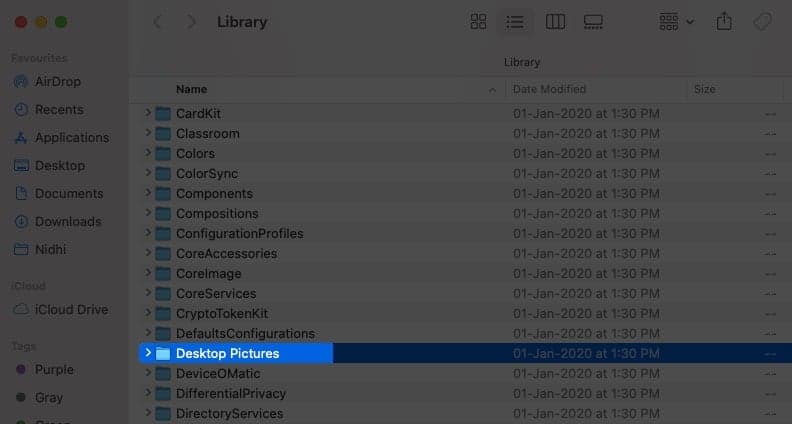Double-click Desktop Pictures folder from Library on Mac