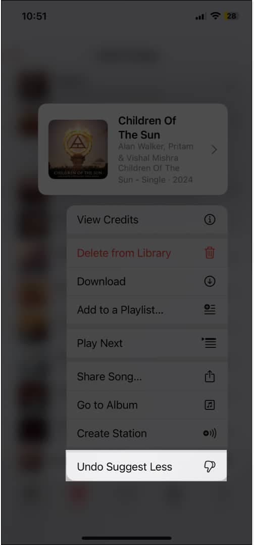 Long press any song and select Undo Suggest Less.