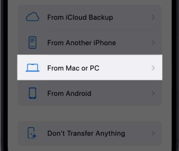 Selecting From Mac or PC option on the Quick Start screen on the new iPhone.