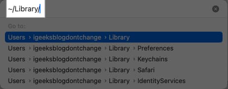 Looking up the Library folder in the Go to Folder window on a Mac.