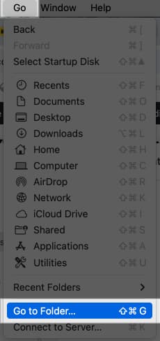 Accessing Finder's Go to Folder option from the menu bar on a Mac.