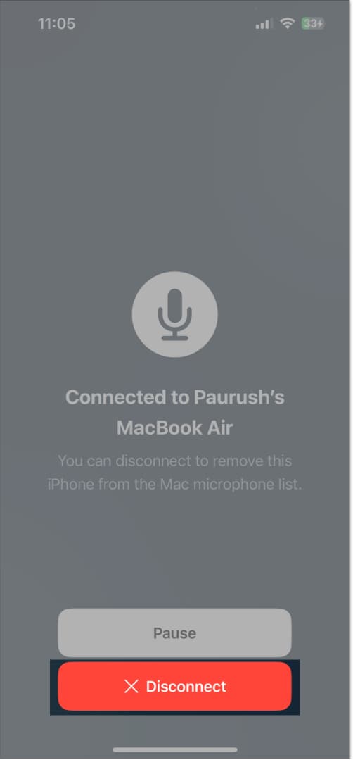 Disconnecting iPhone from the connected MacBook.
