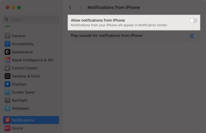 Toggling off the Allow Notifications from iPhone option in the System Settings app on a Mac.