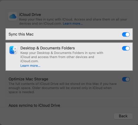 Toggling on Sync this Mac and Desktop & Documents folders options under iCloud Drive settings.