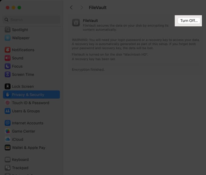 Turning off the FileVault feature on a Mac.