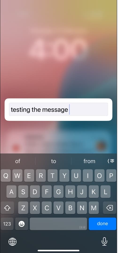 Entering text on an Apple Watch by typing it on the paired iPhone.