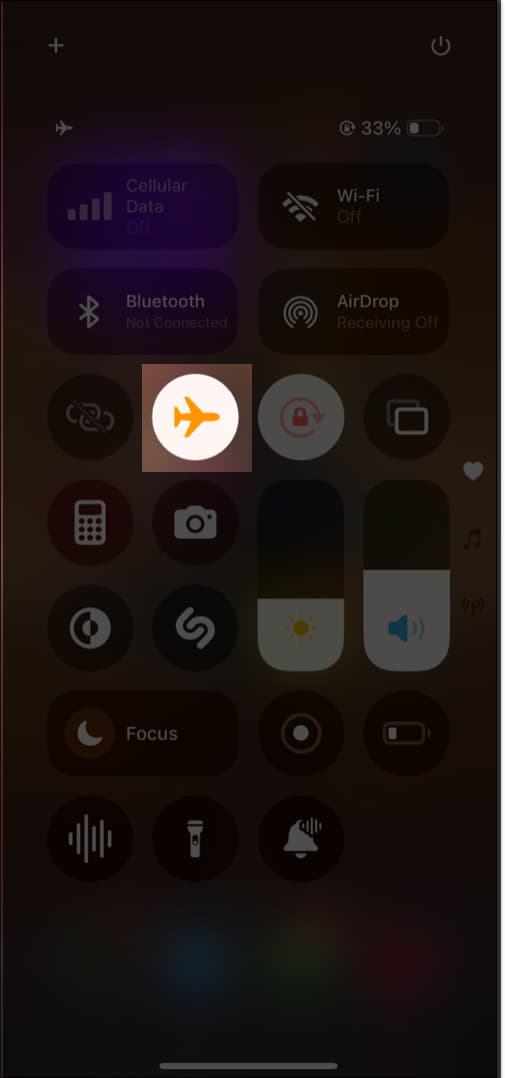 Putting an iPhone into Airplane Mode from the Control Center.