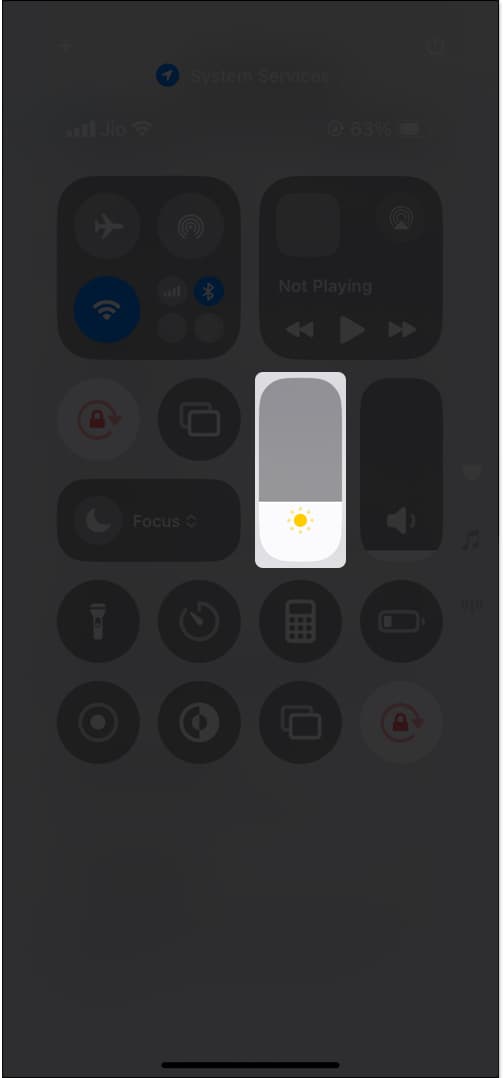 Manage brightness manually from control center on iPhone