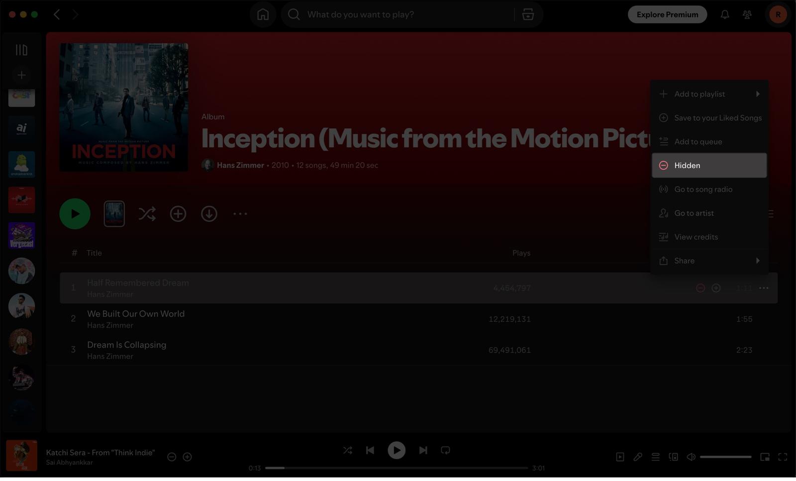 Unhiding a hidden song in a Spotify playlist on a Mac.