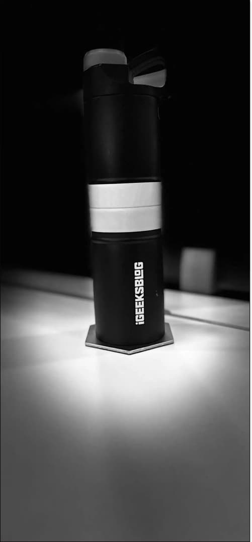 Stage Light Mono Portrait effect on an iPhone.