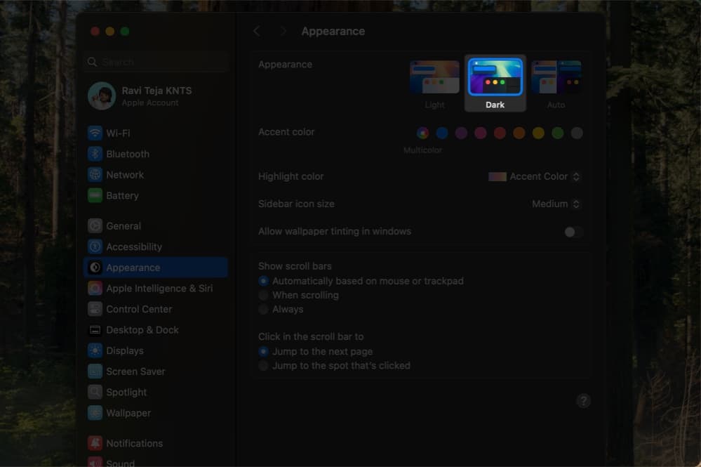 Choosing the Dark appearance in System Settings on a Mac.