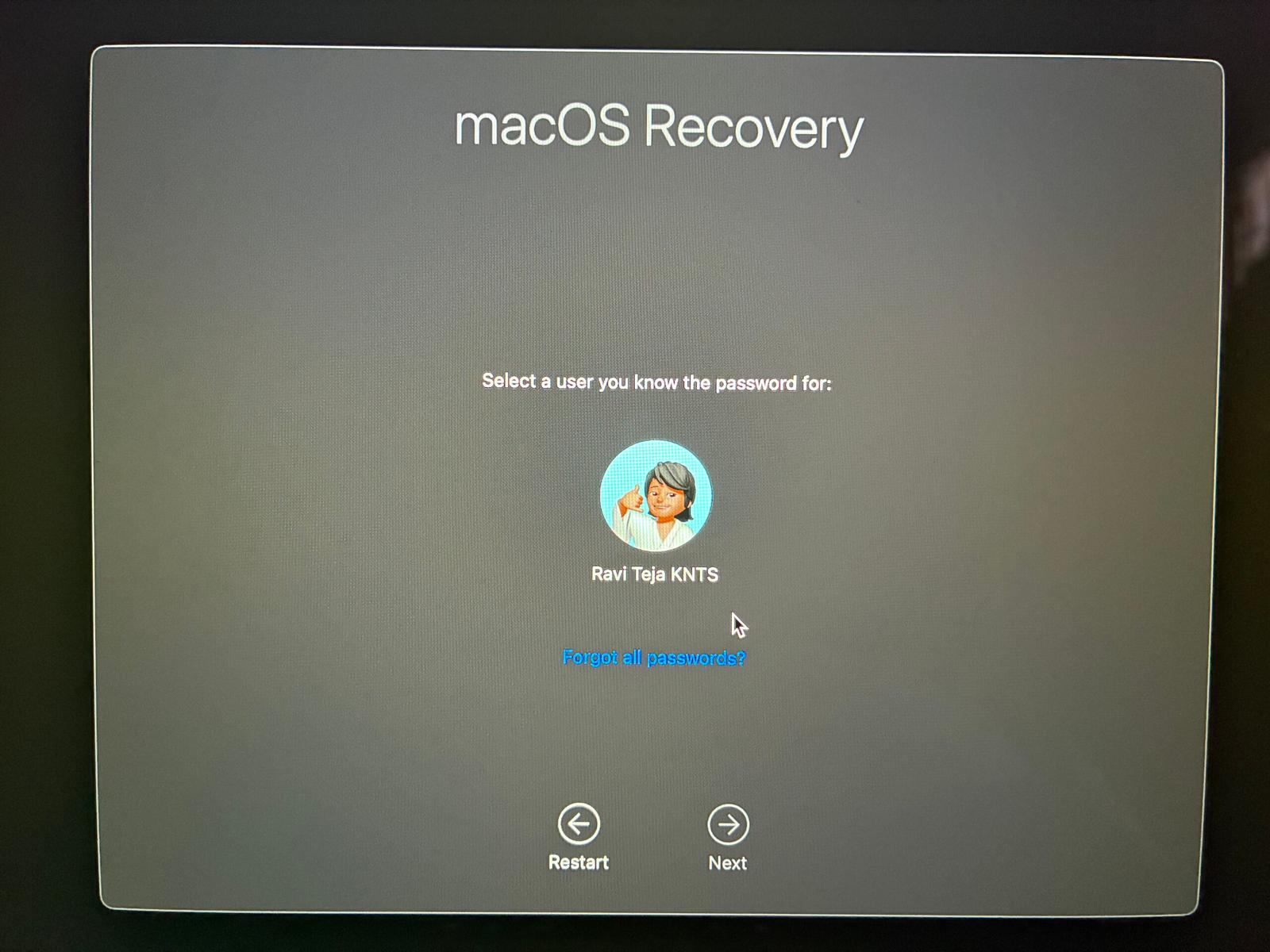 Clicking the Forgot all passwords option on the macOS Recovery screen.