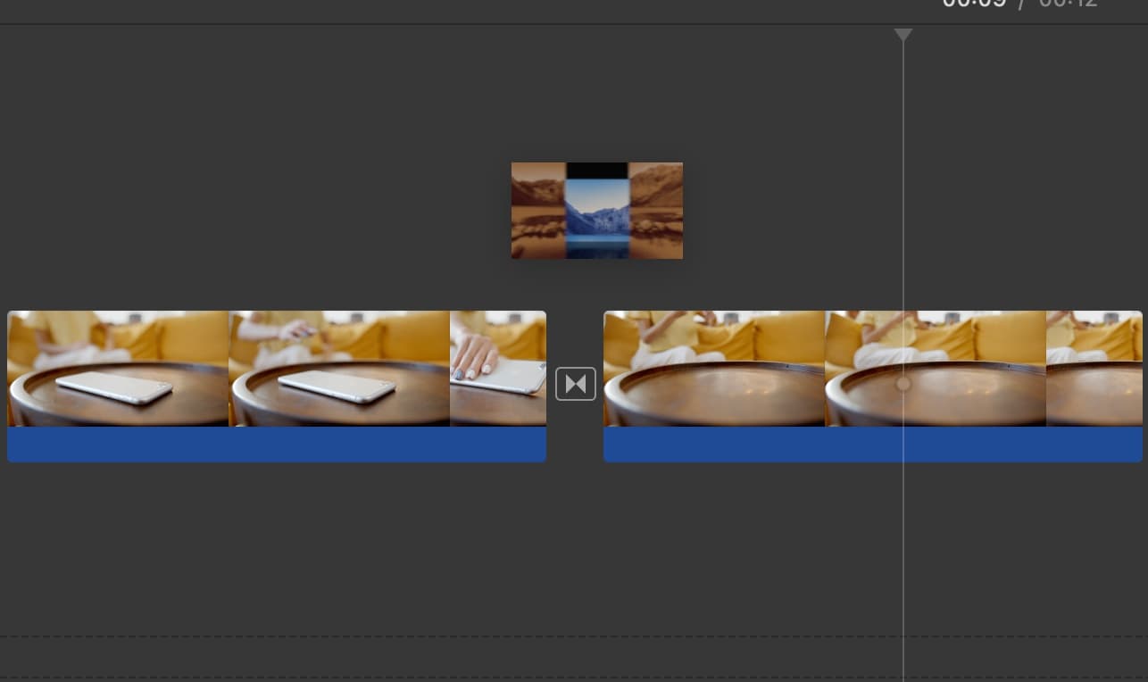 Drag the transition between clips on iMovie in mac