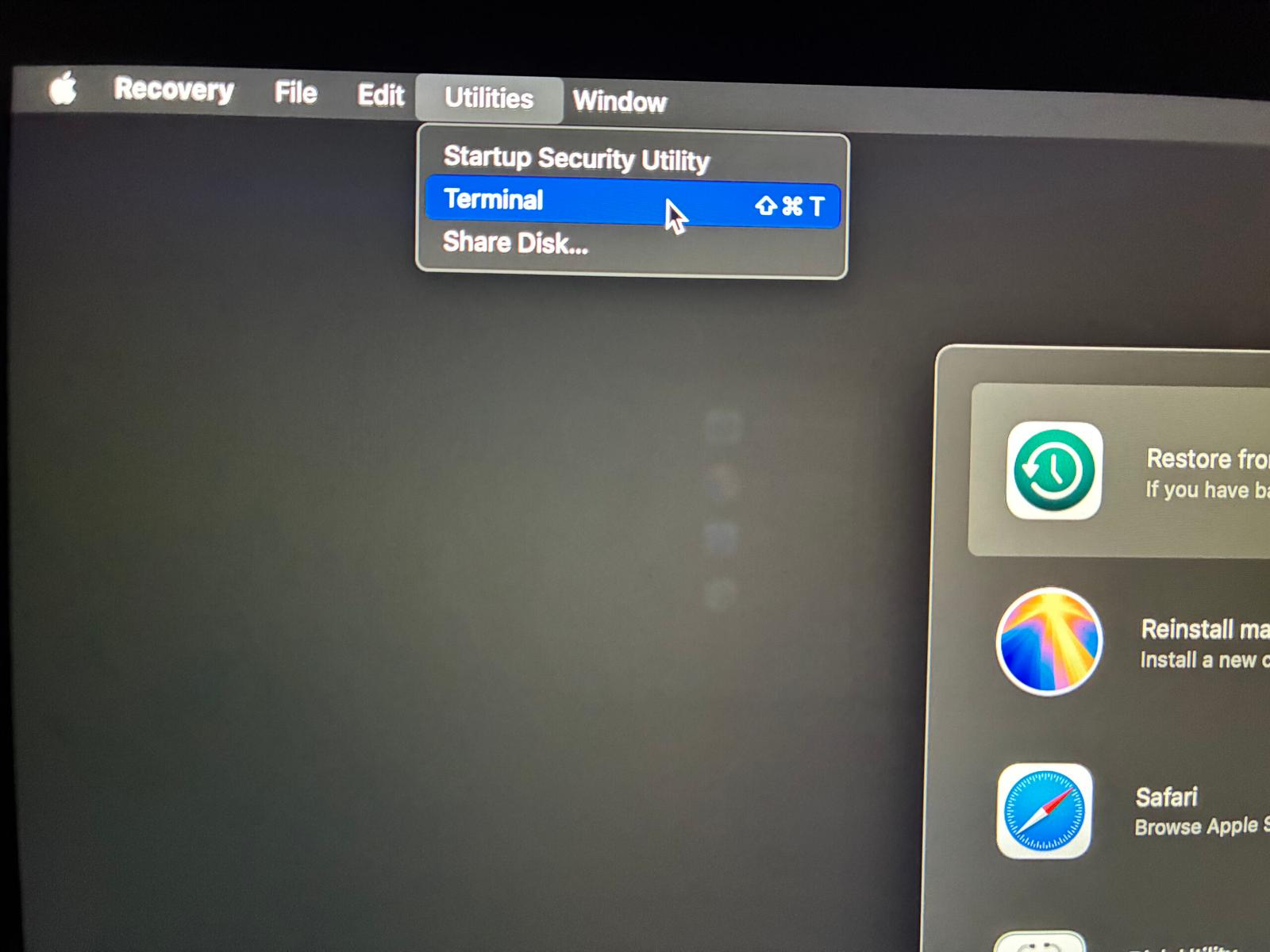 Accessing the Terminal in macOS Recovery.