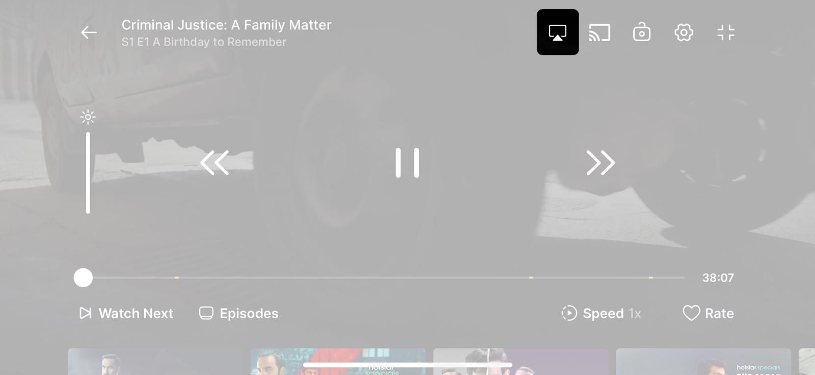 Tapping the AirPlay icon during a media playback on an iPhone.