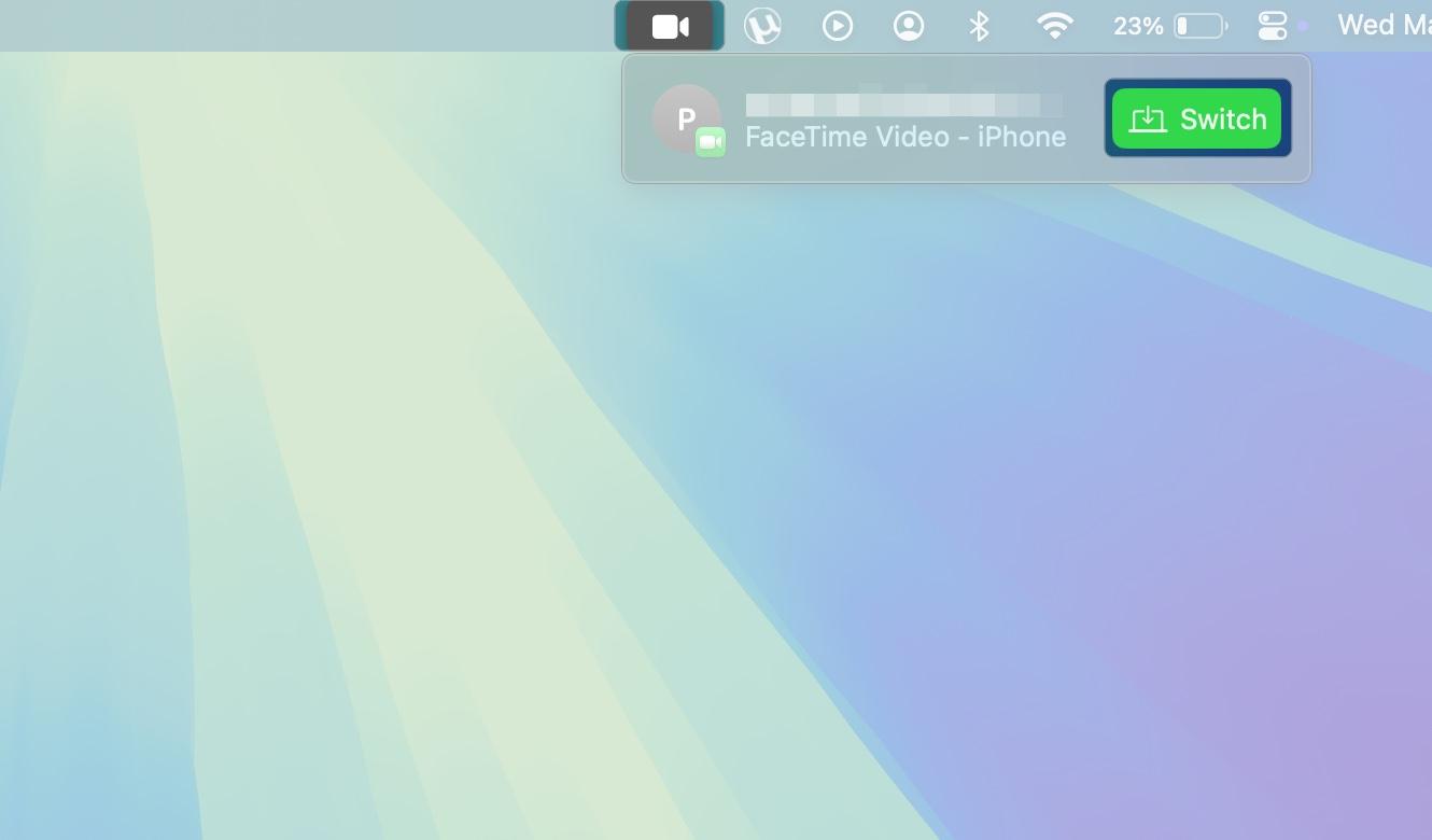 Clicking the Switch button in the FaceTime menu bar icon on a Mac to initiate a FaceTime call switch.