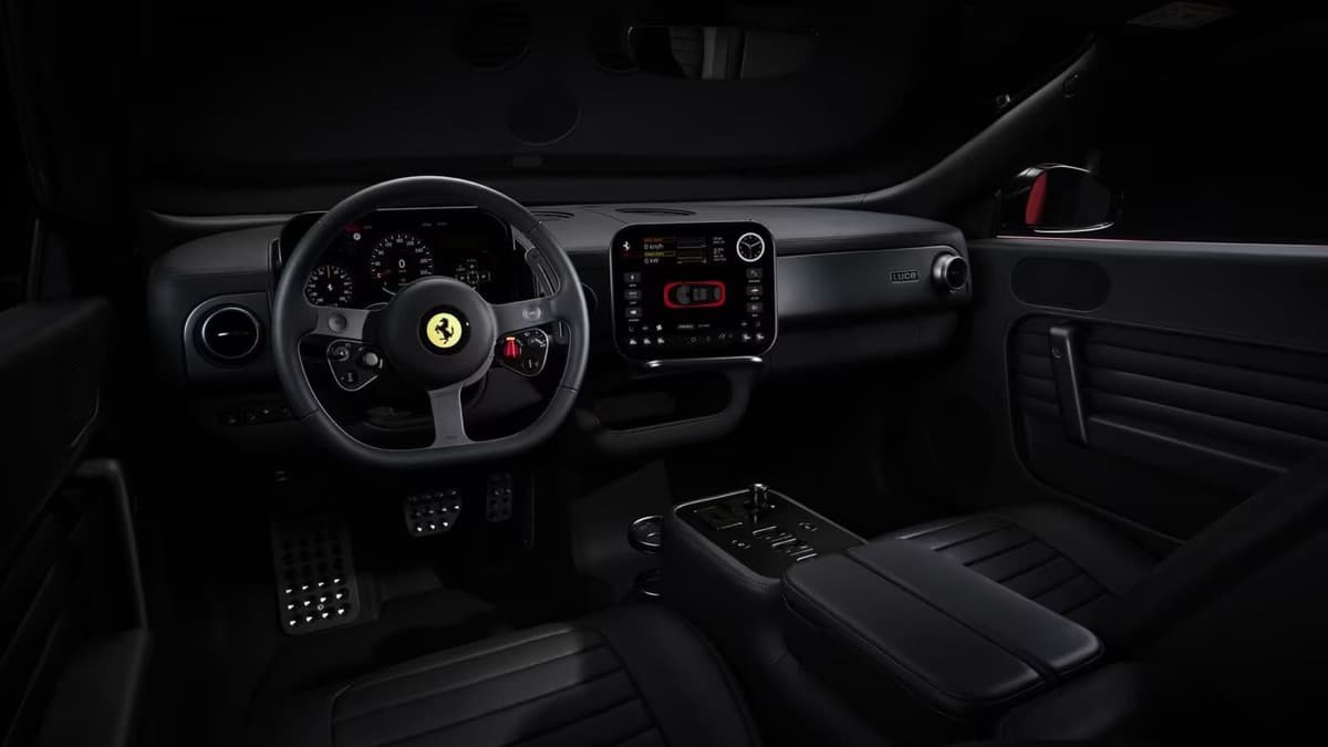 Ferrari Luce interior with steering wheel, physical controls, and digital displays