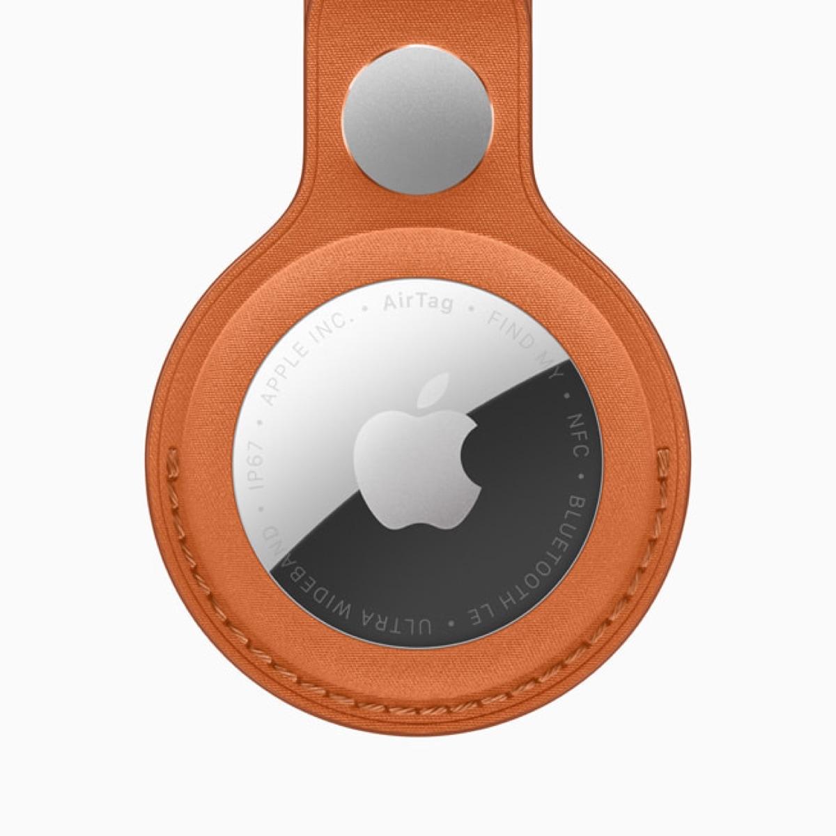 Apple AirTag with FineWoven Key Ring, shown as a size reference for the rumored AI pendant
