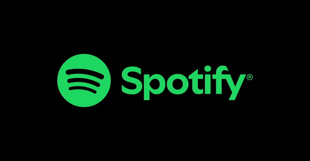 The green Spotify logo on a black background