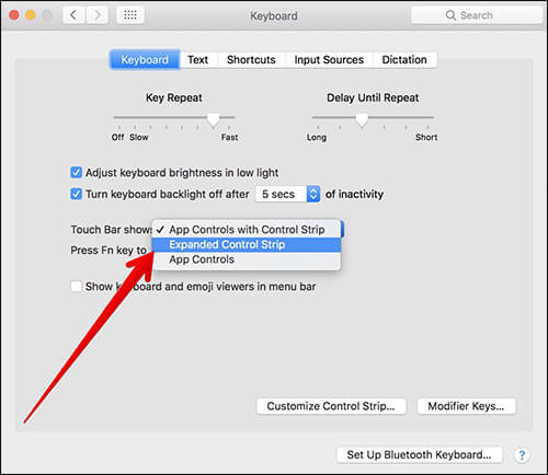 Click on Expanded Control Strip on MacBook Pro