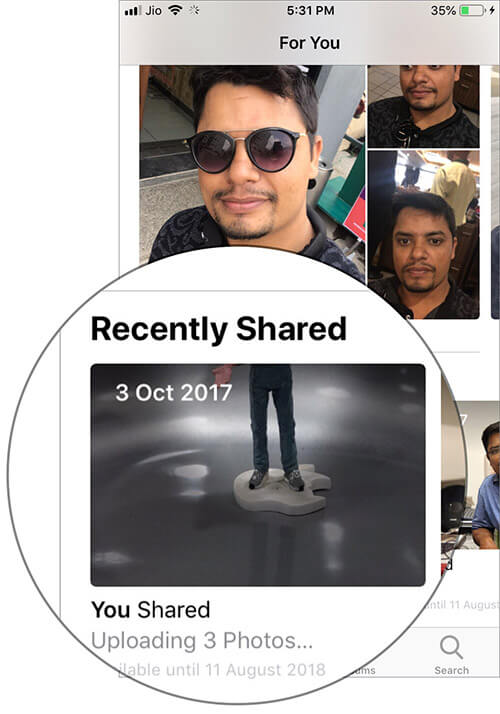 Tap on group of photos in iOS 12 Photos app