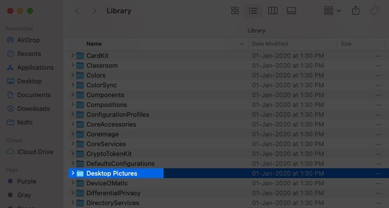 Double-click Desktop Pictures folder from Library on Mac