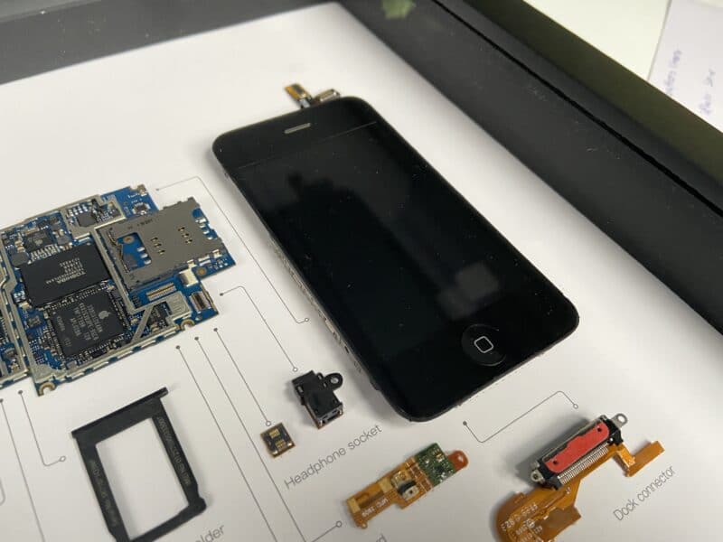 iPhone 3Gs model in wooden frame