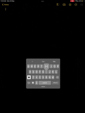Use pinch and zoom gesture from the center of the iPad keyboard