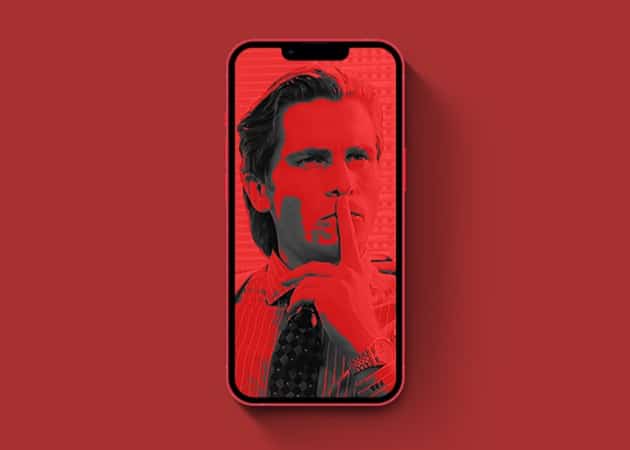 American Psycho face coverver with red color and finger on his lip