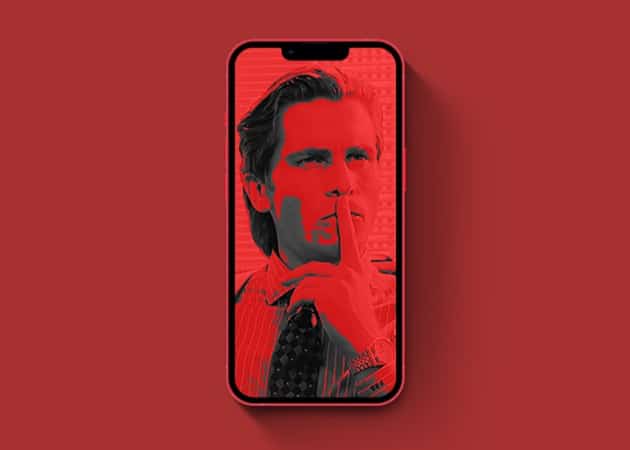 American psycho face coverver with red color and finger on his lip