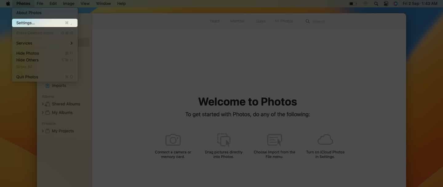 Choosing Photo Settings in top bar on a Mac