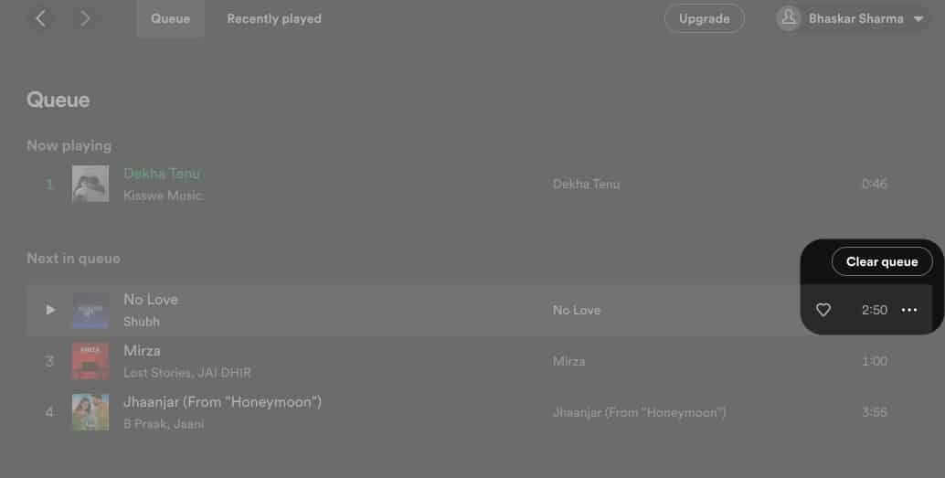 Klik pada Kosongkan baris gilir dalam Spotify pada Mac
