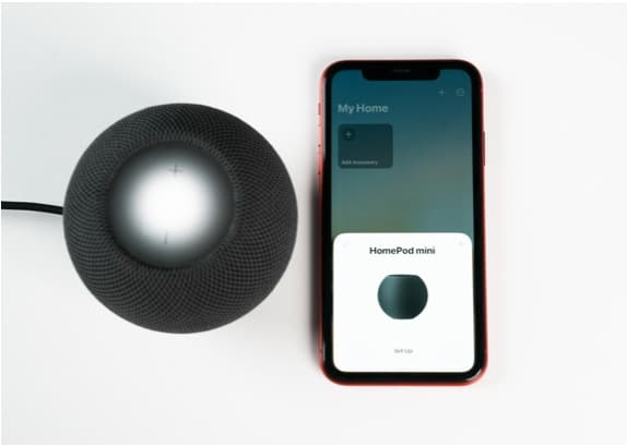 unlock your iPhone or iPad and place it near the HomePod