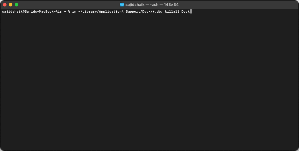 Terminal window on Mac with command to reset Dock