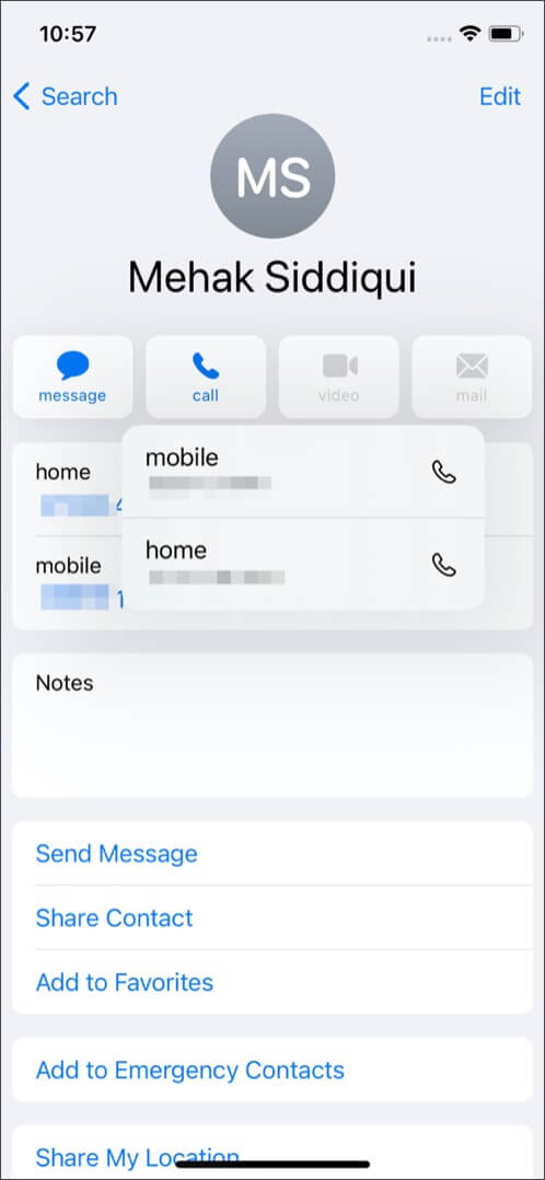 Change the default phone number in Contacts on iPhone