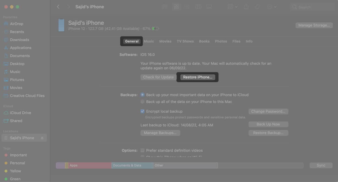 Select the General tab and select the Restore iPhone in Mac Finder