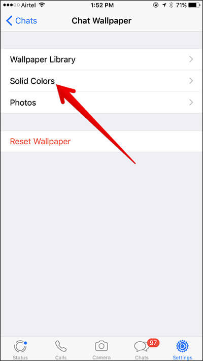 Tap on Solid Colors in WhatsApp on iPhone