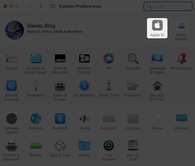 click Apple ID from System Preferences on Mac