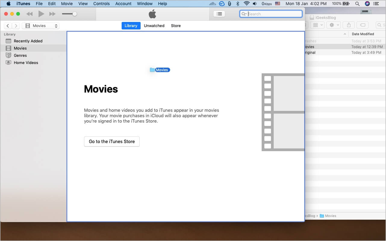 Press and hold Option key and drag Movies folder from external drive to iTunes