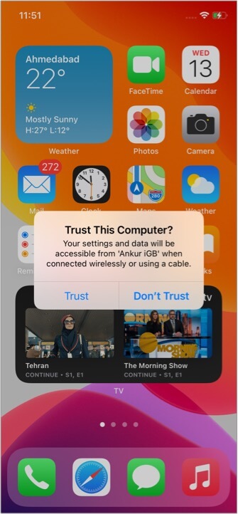 Tap Trust on your unlocked iPhone