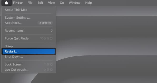Select the Apple Logo and tap Restart on Mac
