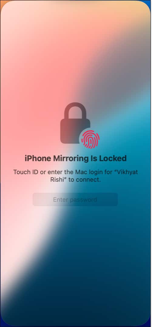 Unlocking the iPhone Mirroring app on a Mac using Mac password or Touch ID