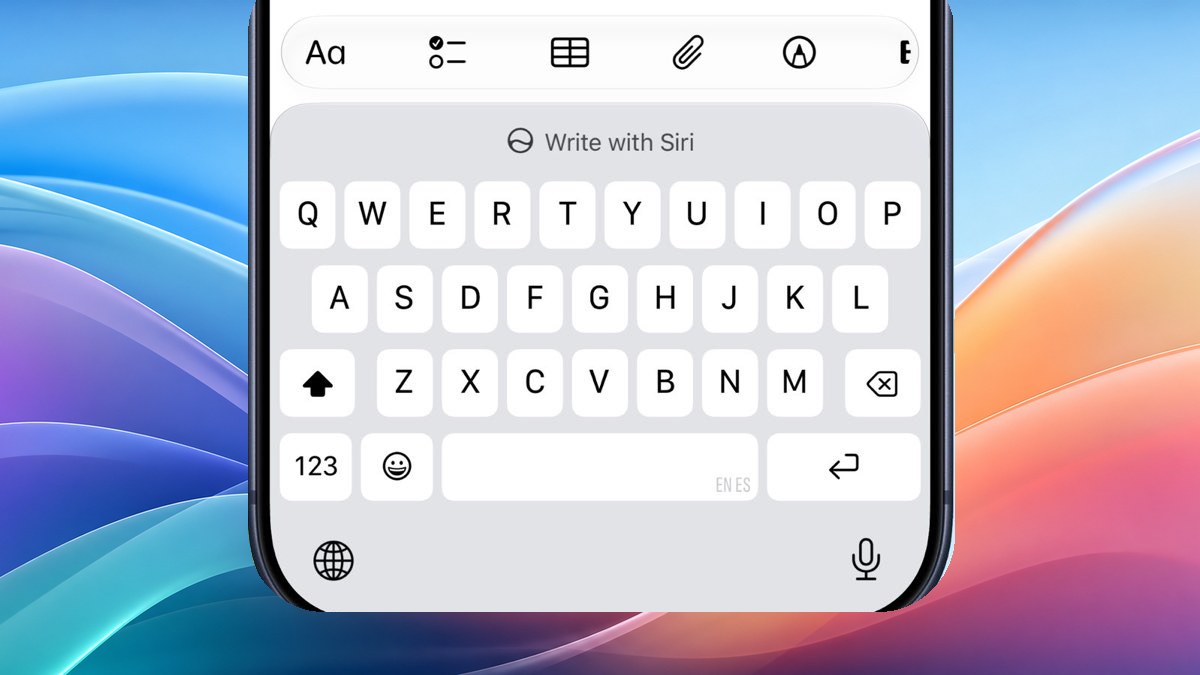 Write with Siri button above the iPhone keyboard in iOS 27 beta 2 with a Mac-style wallpaper background