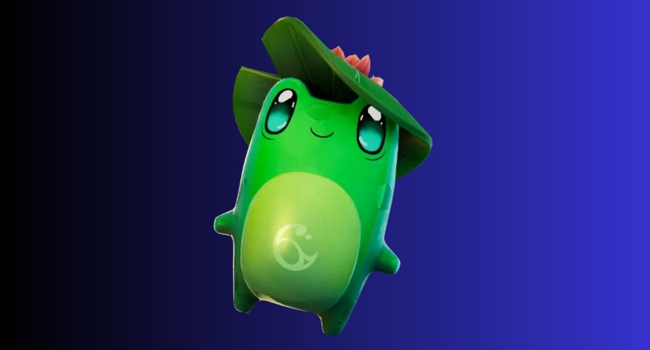 Cute green cartoon dragon wearing a leaf hat, smiling against a dark blue gradient backdrop.