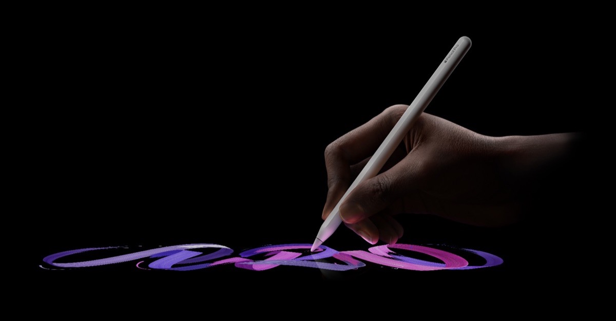 Apple Pencil Pro being used on an iPad, shown as an illustrative image