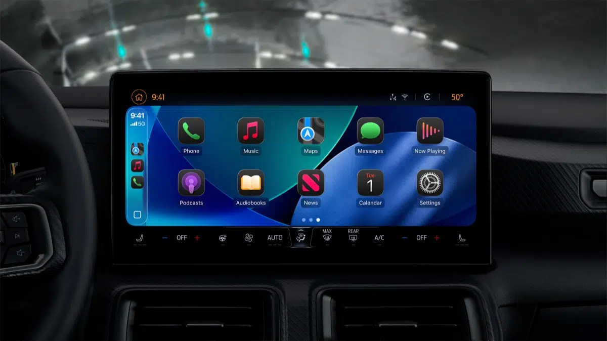 Apple CarPlay dashboard in dark mode with app icons