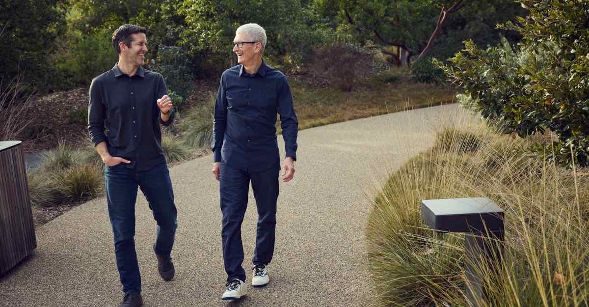 Tim Cook and John Ternus walking together at Apple Park